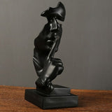 statue visage noir