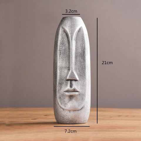 Taille vase tête argent