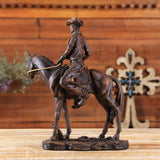 statue de cowboy sur cheval