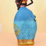 statue africaine en robe