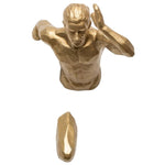 statue murale homme en or