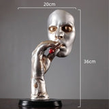 statue d'homme argent