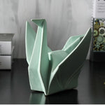 Statue origami verte